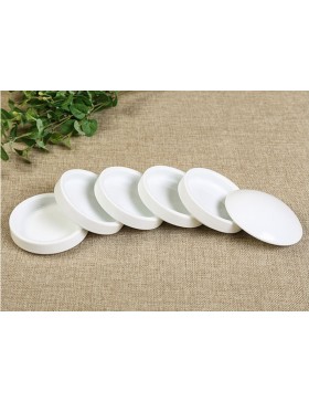 Set of five small ceramic paint dishes with lid